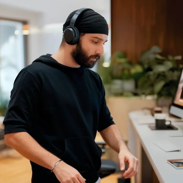 Tavlean working at a laptop